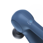 Load image into Gallery viewer, close up of the power button on the Therabody Theragun Relief in navy