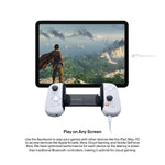 Load image into Gallery viewer, Backbone One lightning PlayStation edition plugged in to a lightning cable, linked to a screen displaying a video game