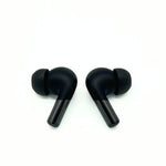 Load image into Gallery viewer, Comply True Grip Memory Foam Ear Tips on black earphones