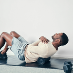 Load image into Gallery viewer, Man uses Therabody Wave Roller on his back