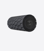 Load image into Gallery viewer, Side view of Therabody Wave Roller displaying its distinctive wave design and control panel