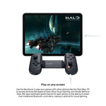 Load image into Gallery viewer, Backbone One lightning plugged in to a lightning cable, linked to a screen displaying a video game