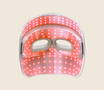 Load image into Gallery viewer, Back view of Therabody Theraface Mask Glo with red light therapy activated
