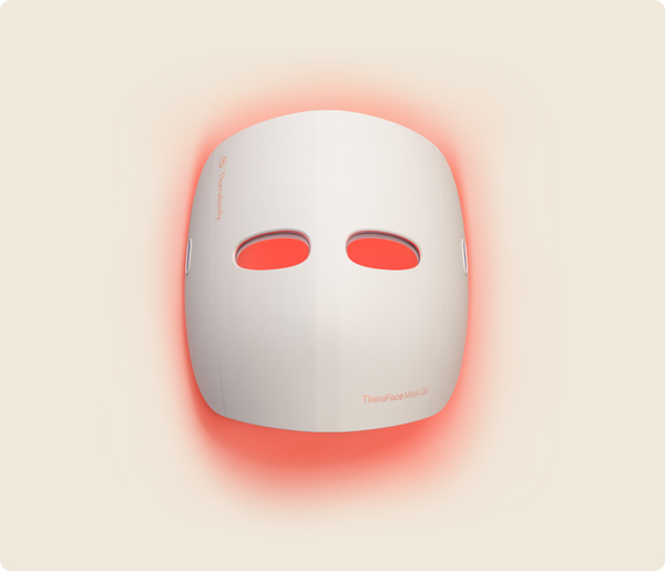 Therabody Theraface Mask Glo with red light therapy activated 