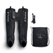 Therabody JetBoots Prime, its carry bag and cable laid out on a white background