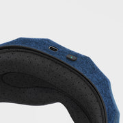Top view of Therabody SleepMask displaying the charging port and button