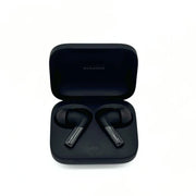 Comply True Grip Memory Foam Ear Tips on black earphones in black earphone casing