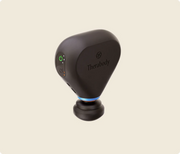 Slanted view of Therabody Theragun Mini Plus with maximum speed and medium heat level