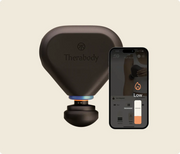 Front view of Therabody Theragun Mini Plus with heat attachment, accompanied by a phone displaying the heat control panel for the massage gun on the Therabody app 