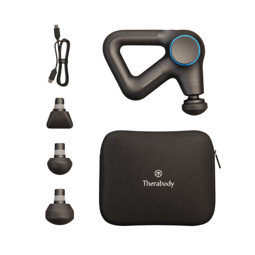 Therabody Theragun Prime Plus, its carry case, charging cable and attachments laid out on a white background