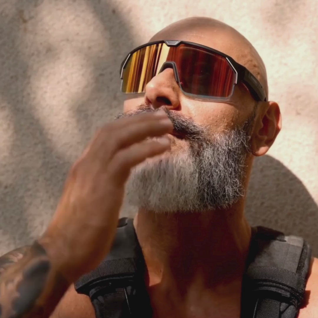 video of various men changing the tint levels on the Chamelo Music Shield they are wearing