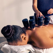 Woman uses Therabody Theracup on her client
