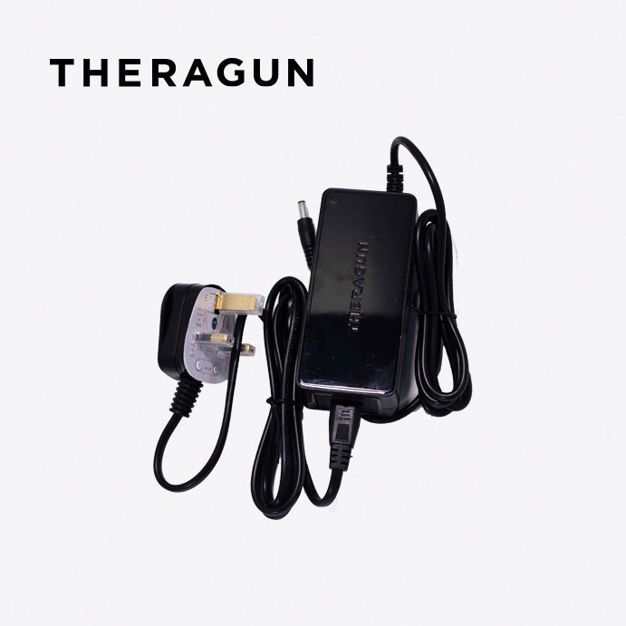 Theragun AC adaptor on a white background