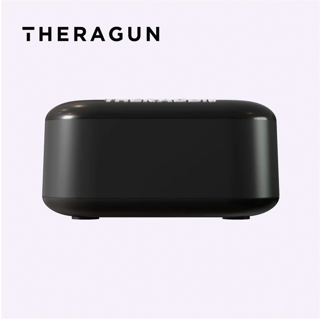 side view of Theragun Battery Charger on a white background