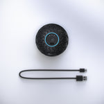 Load image into Gallery viewer, Therabody Wave Solo with its ccharging cable on a white background
