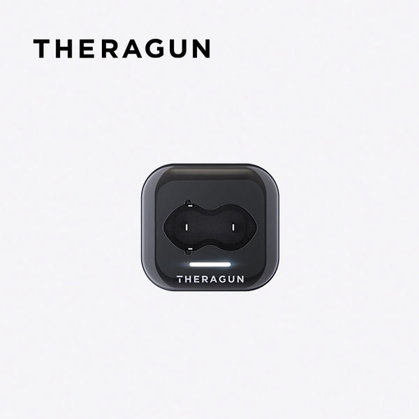 top view of Theragun Battery Charger on a white background