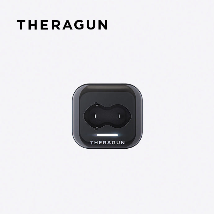 top view of Theragun Battery Charger on a white background